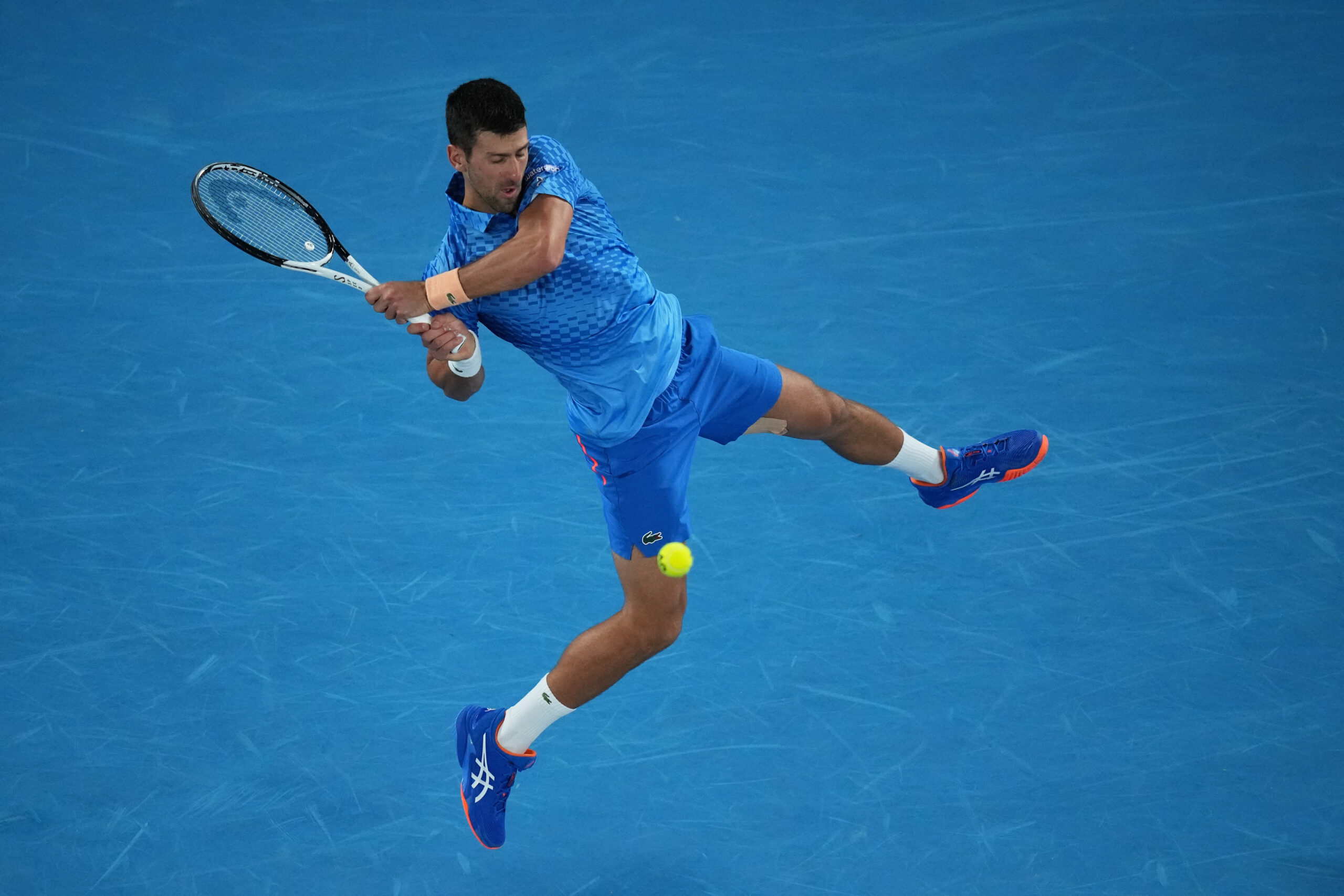 How to Hit the Double Handed Backhand Like Novak Djokovic